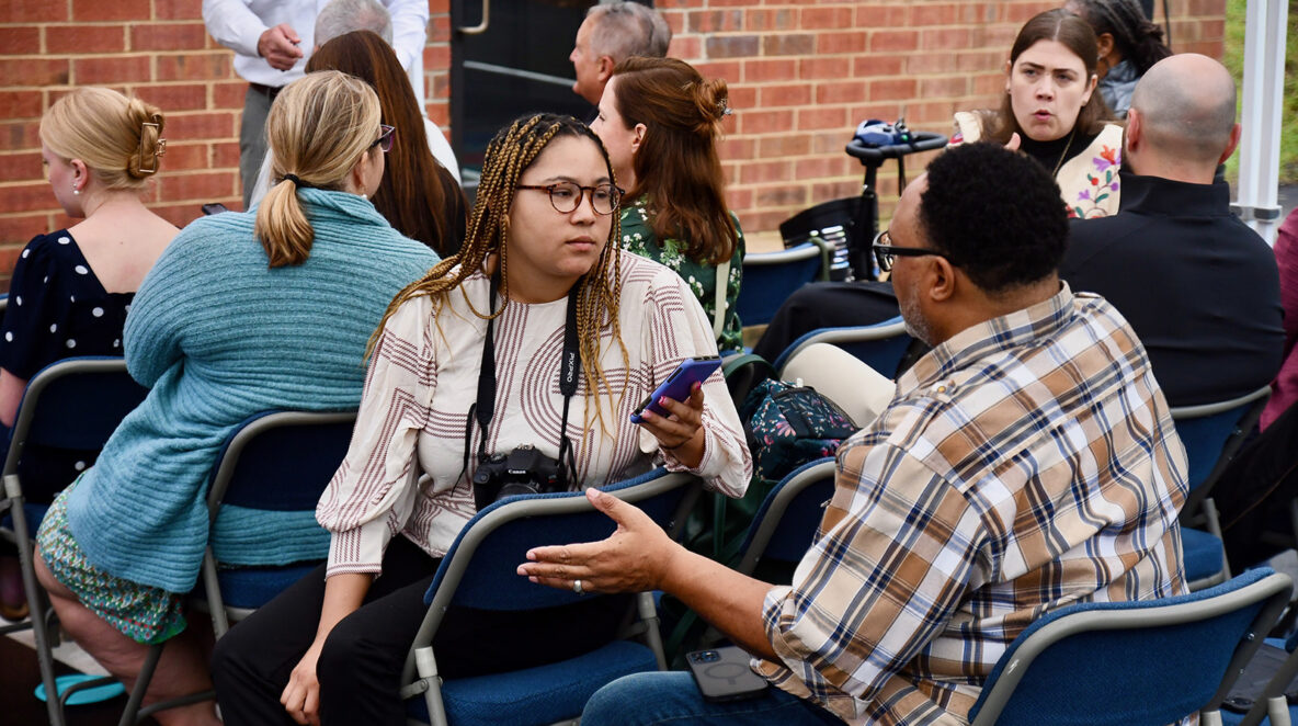 Qcity Metro reporter Destiniee Jaram conducts an interview at the opening of a small business hub Credit: QCity Metro