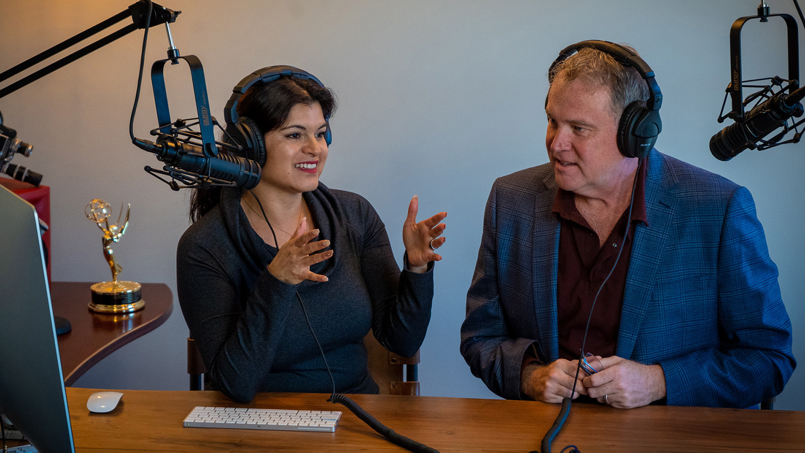 Hola Carolina’s Adriana Chavela in the studio for the community connection podcast and radio show #CommunityVibes. Credit: Hola Carolina.